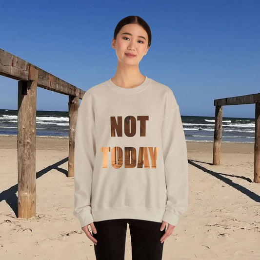 Unisex crewneck sweatshirt with "Not Today" design on a beach background.