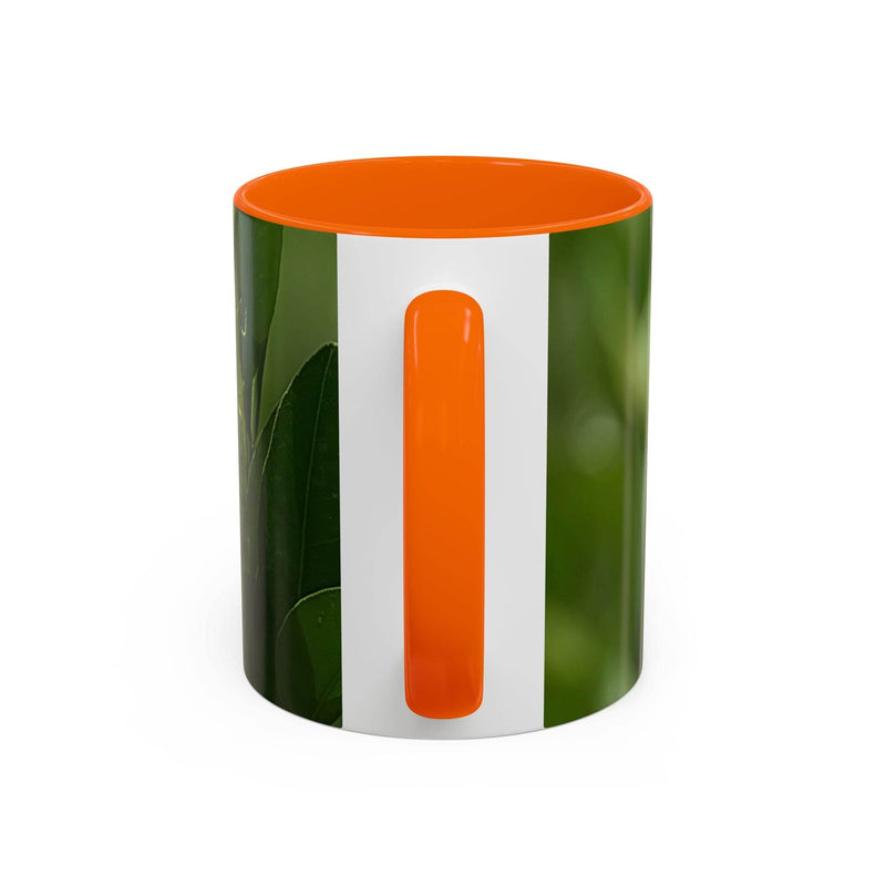 Keramik Kaffeebecher mit Früchten, 325ml groß, aufgewertet mit einem orangem Henkel und einer orangen Innenseite.