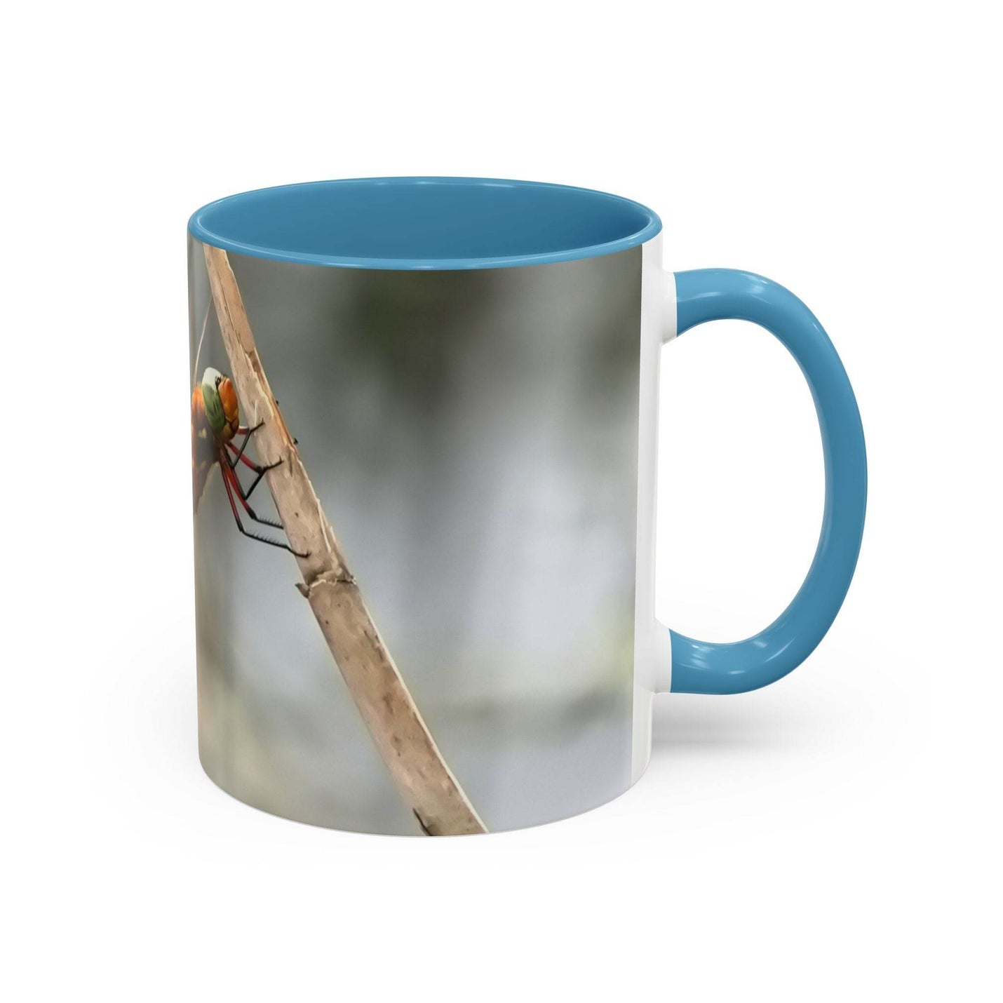 High-quality 325ml ceramic mug featuring a dragonfly illustration with an eye-catching contrast light blue handle and interior.