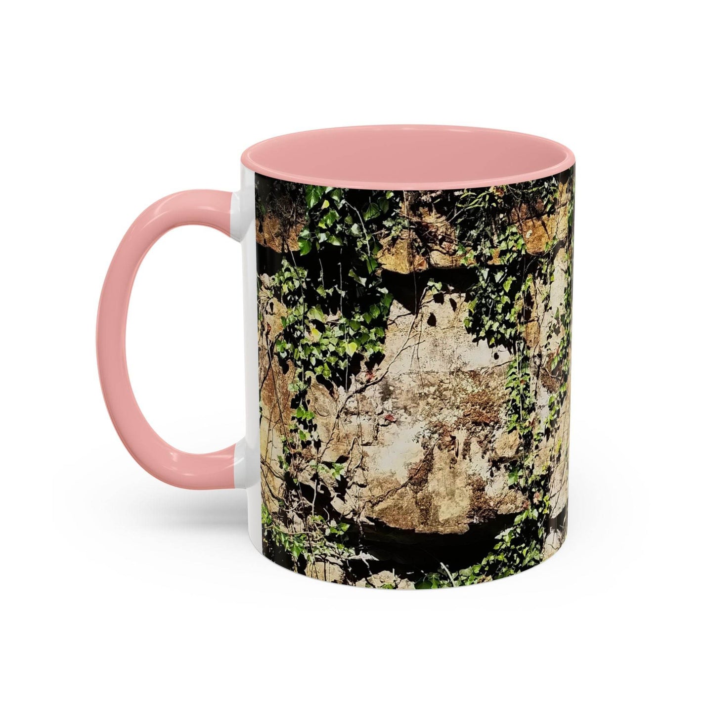 Robust 11oz Mug - Overgrown Rocks Adventure Coffee Mug with a pink handle and pink inside on a bright tabletop.