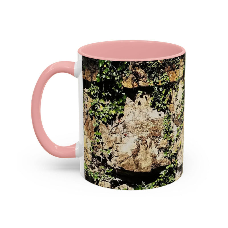 Robust 11oz Mug - Overgrown Rocks Adventure Coffee Mug with a pink handle and pink inside on a bright tabletop.