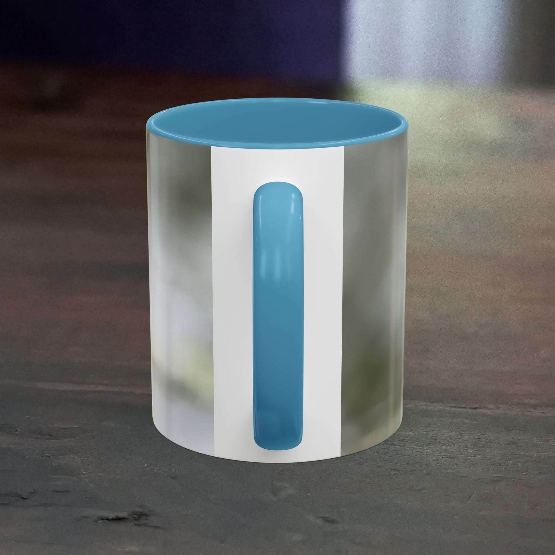 White ceramic mug with pretty dragonfly design and blue handle, 11oz capacity.