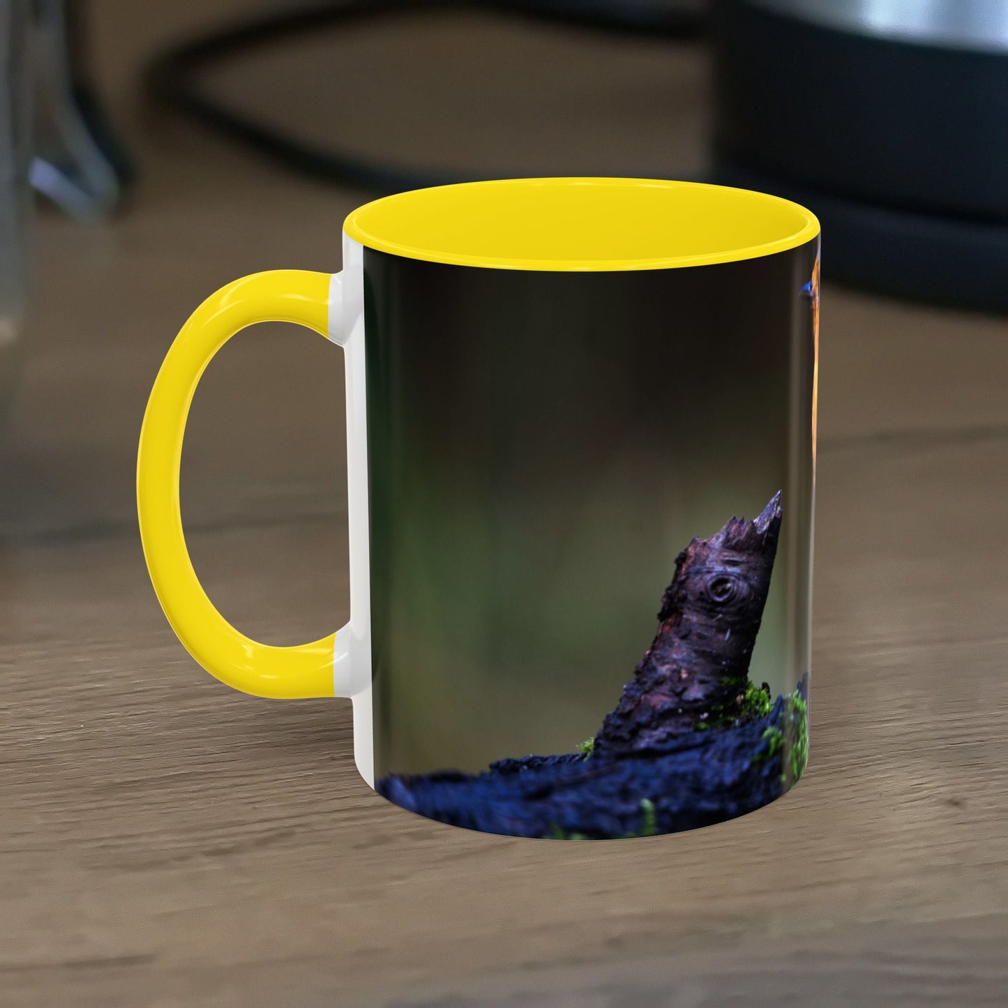 White ceramic 11oz mug featuring a vibrant robin illustration with a yellow handle and interior, perfect for nature lovers.
