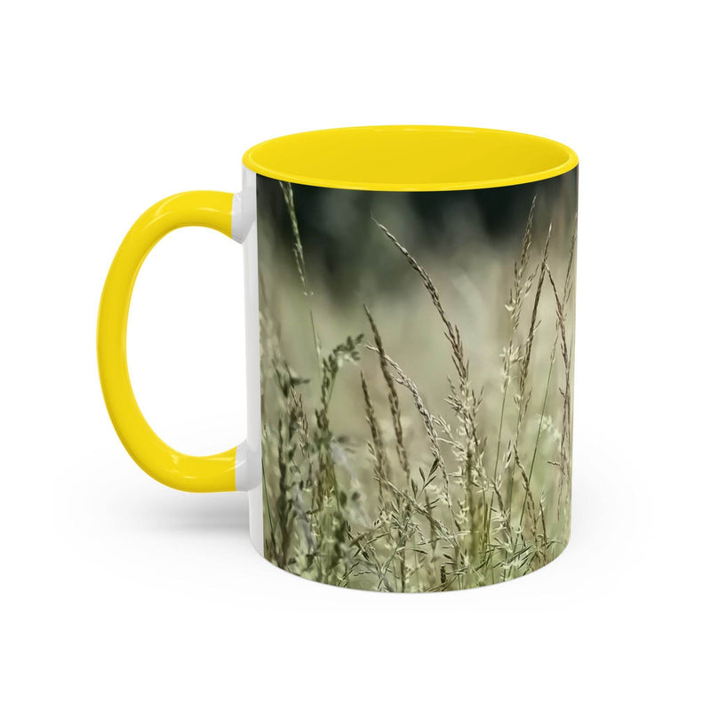 Botanical 11oz Mug, Flowering Grass - Bring Nature Inside with a yellow handle and yellow inside near a window.