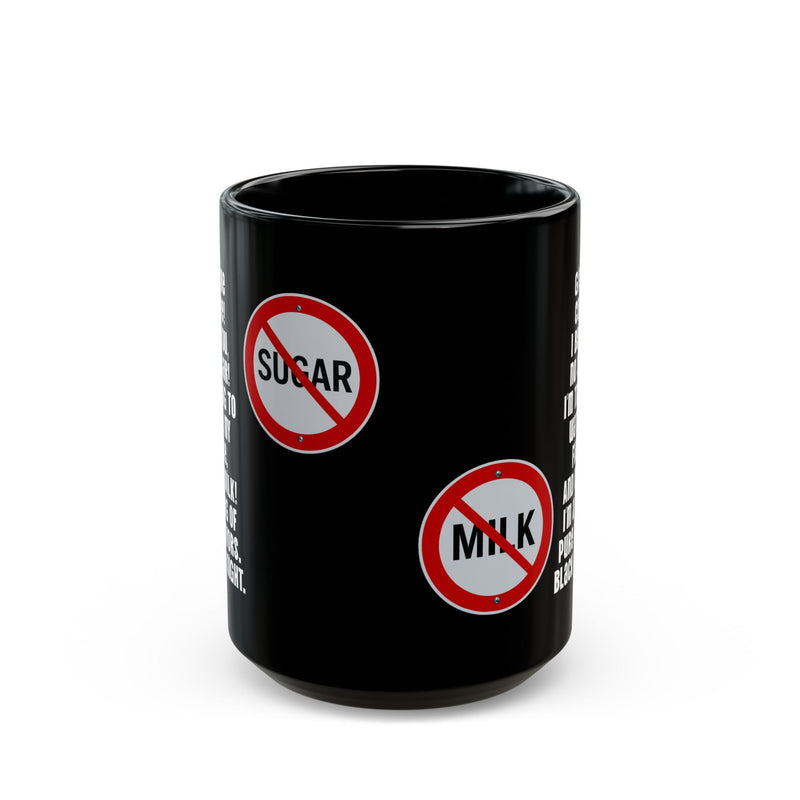 Charming 15oz black ceramic mug with a confident black coffee declaration text, perfect for quiet focus before the day begins.
