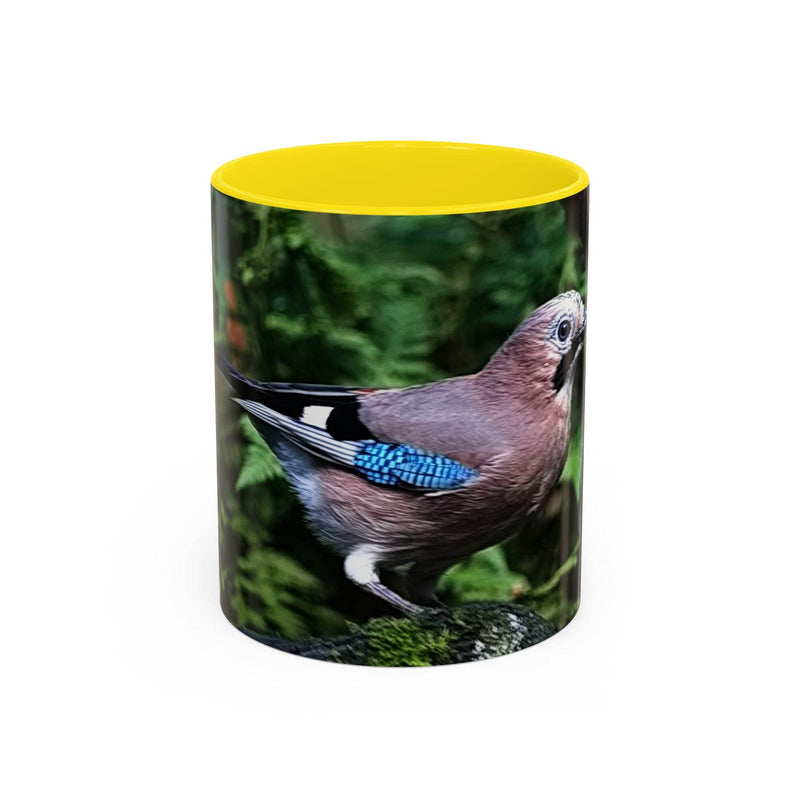 11oz colorful jay coffee mug with a yellow handle and yellow inside.