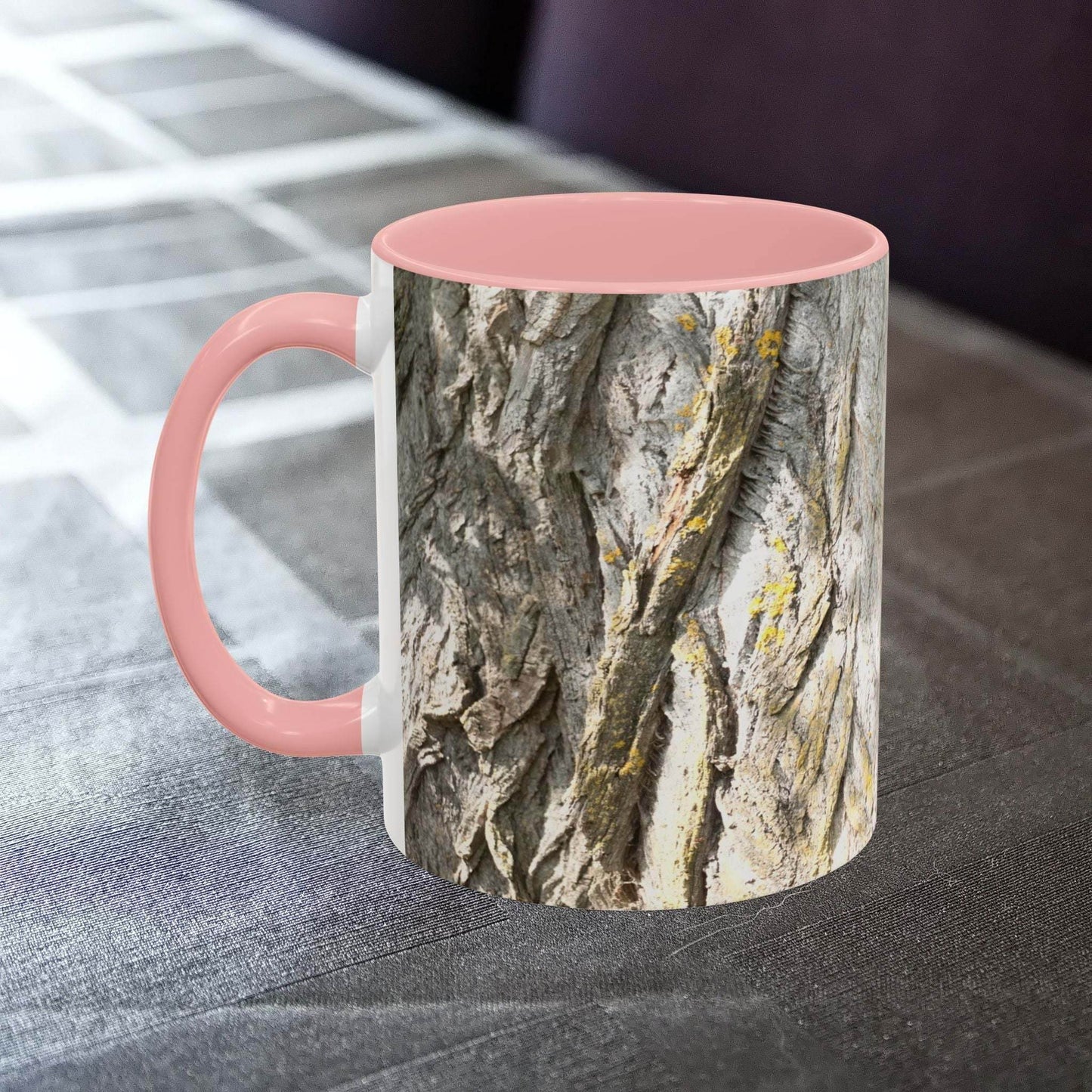 Coffee mug with a tree trunk design and pink interior, offering a cozy and rustic vibe for nature lovers.