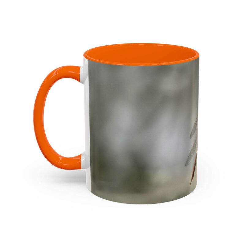 Glossy 325ml dragonfly coffee cup printed with high-quality ink, finished with a classic orange handle and solid orange inside.