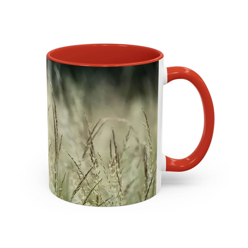 Cozy lifestyle view of 11oz Mug, Flowering Grass - Bring Nature Inside styled with a red handle and red inside for autumn.