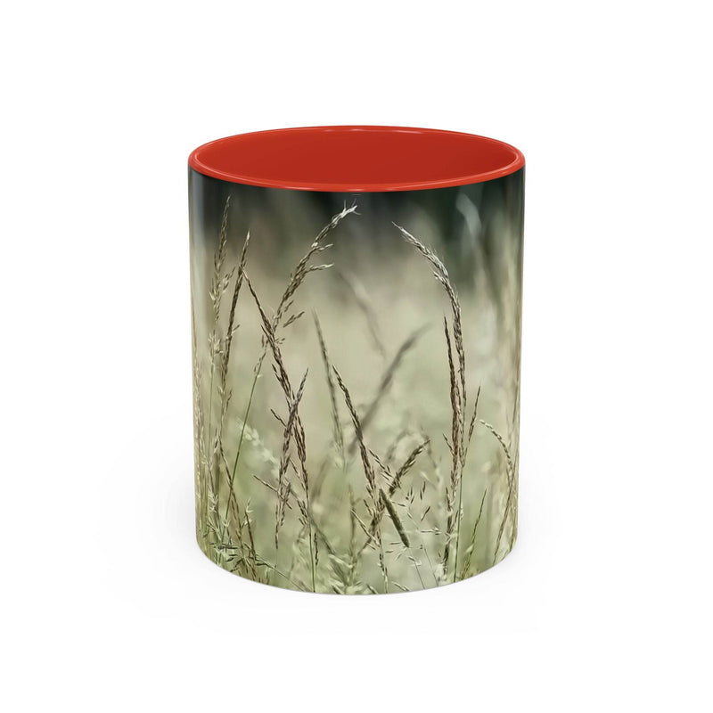 Detailed 11oz Mug, Flowering Grass - Bring Nature Inside showing the red handle and red inside near warm textiles.