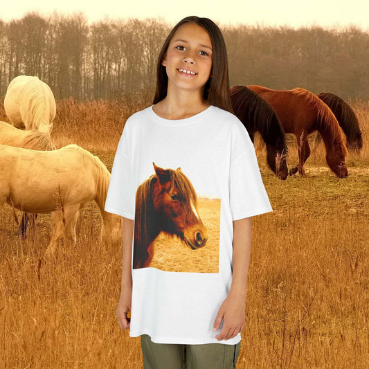 Kids wearing horse-themed tee in field with horses, Kids Tee for Horse Loving Child.