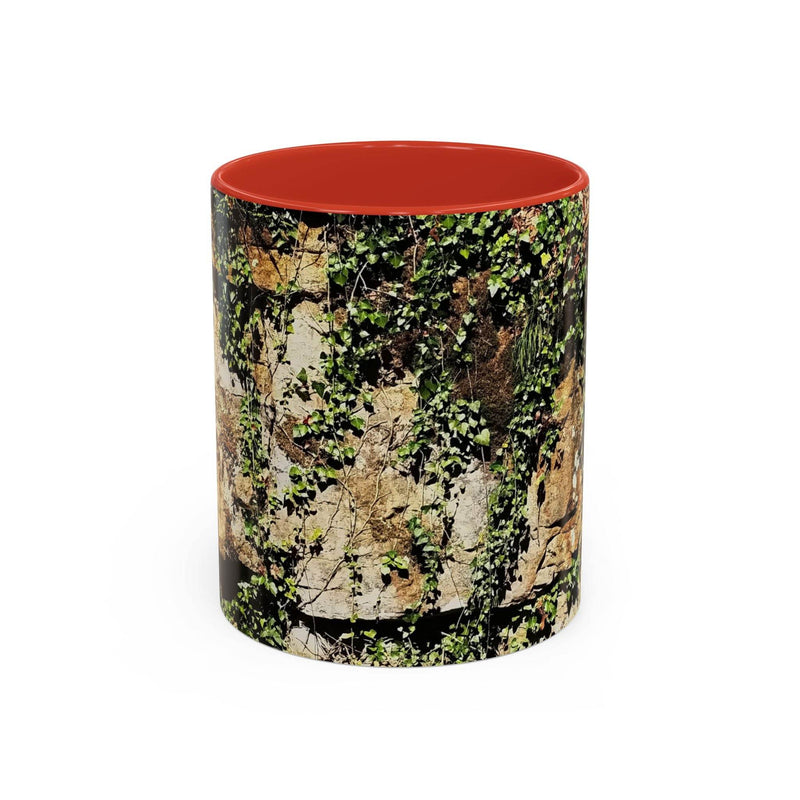 Adventurous 11oz Mug - Overgrown Rocks Adventure Coffee Mug showing the red handle and red inside near textiles.