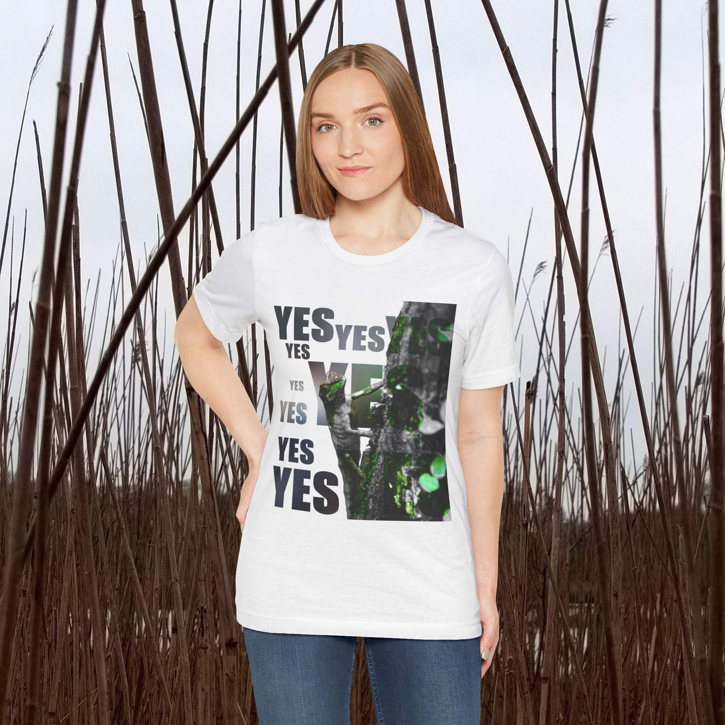 Unisex Tee with "Yes and No" graphic, nature print, worn by a model in an outdoor setting.