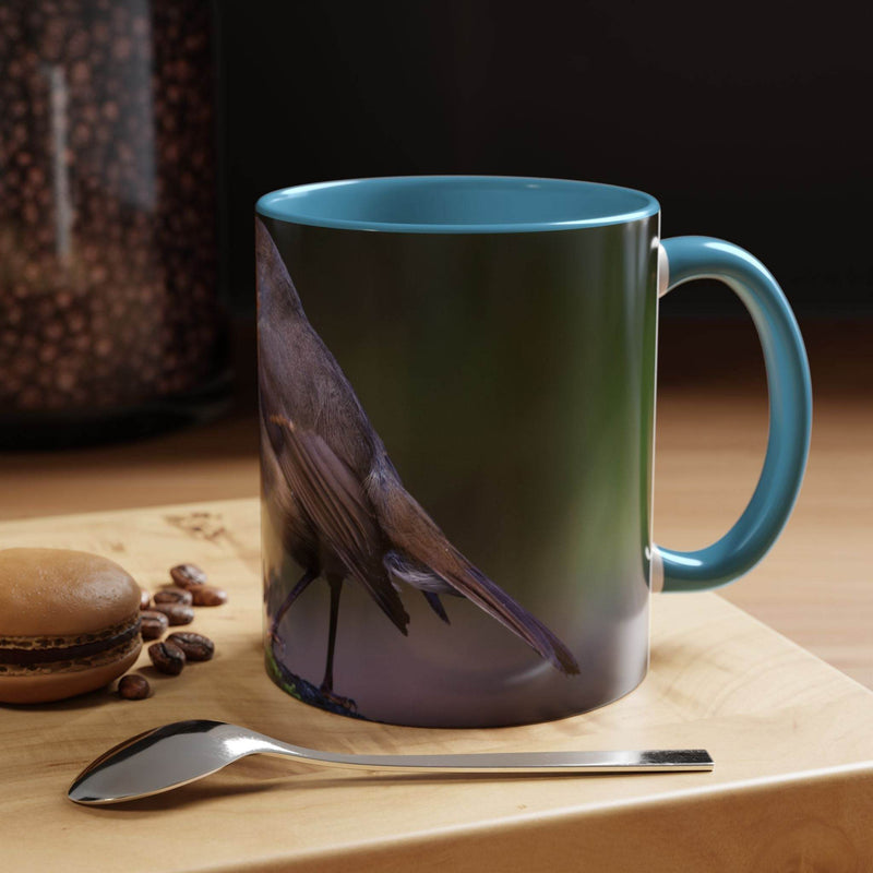 Elegant 11oz ceramic robin mug showcasing a light blue handle and light blue inside, designed for passionate bird lovers.