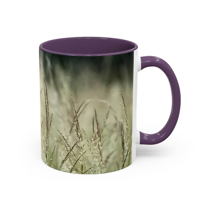 Cozy lifestyle view of 11oz Mug, Flowering Grass - Bring Nature Inside styled with a purple handle and inside.