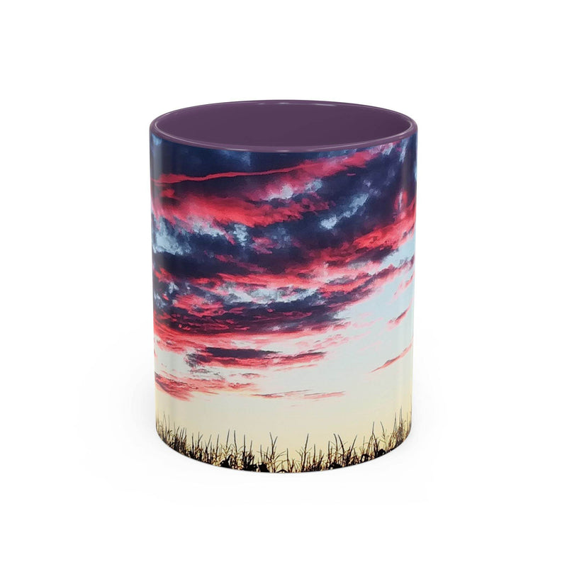 Artistic 11oz Sunset Accent Coffee Mug with a purple handle and purple inside on a desk surface.