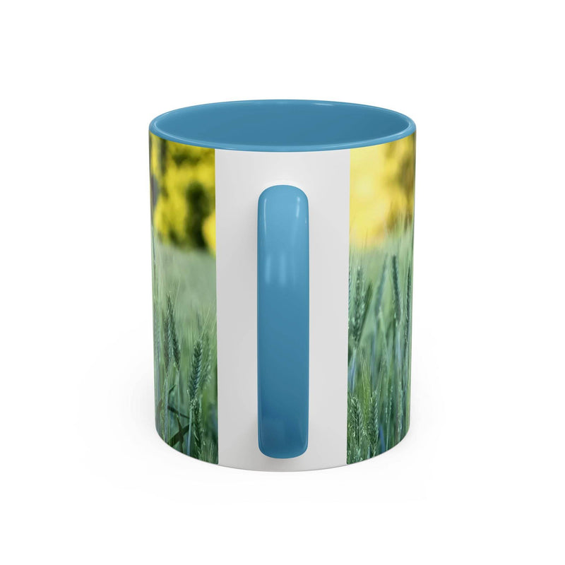 Premium 11oz Mug - Wheat Field Design Coffee Mug on a table, featuring a light blue handle and inside layout.