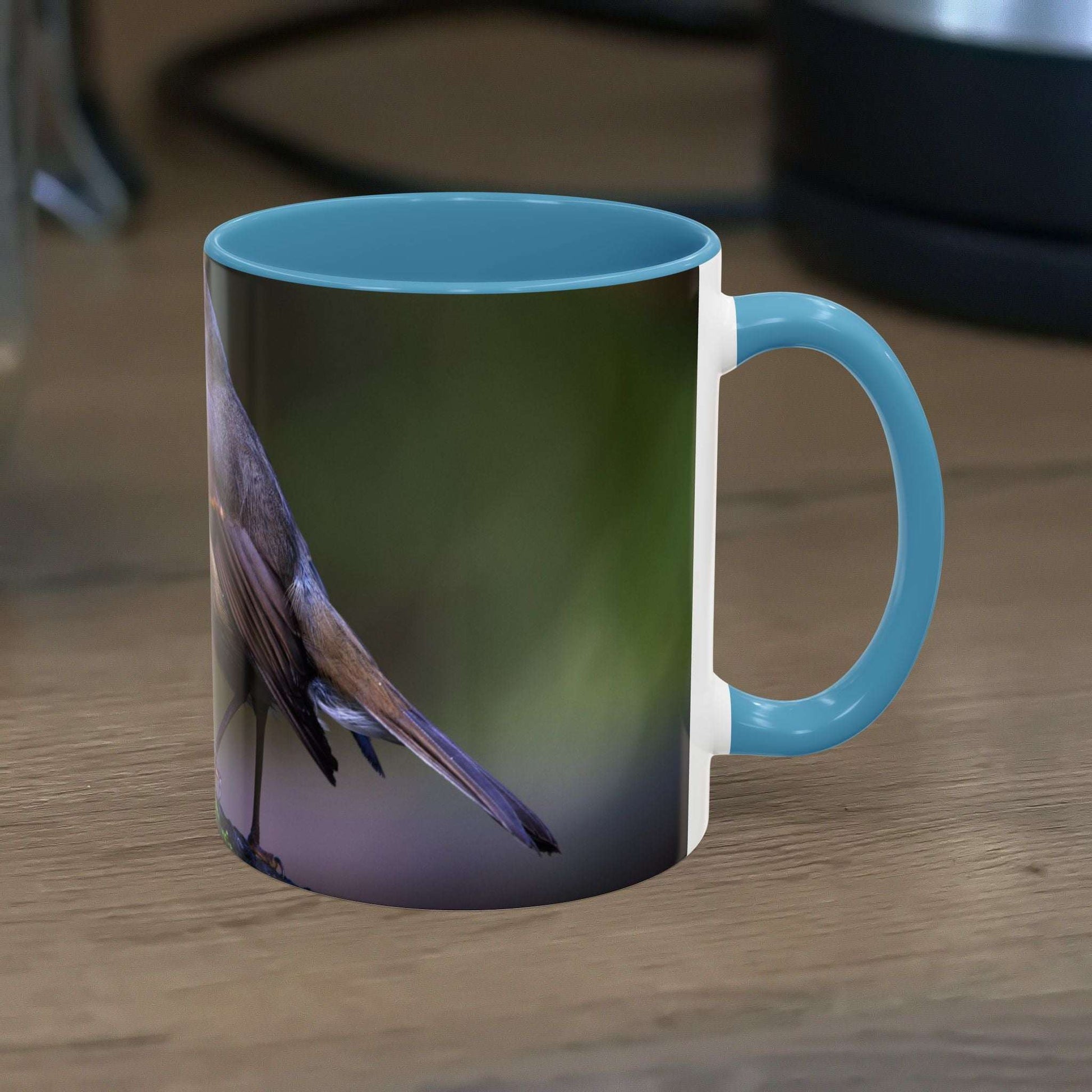 White ceramic Robin Mug with robin illustration, 11oz capacity.