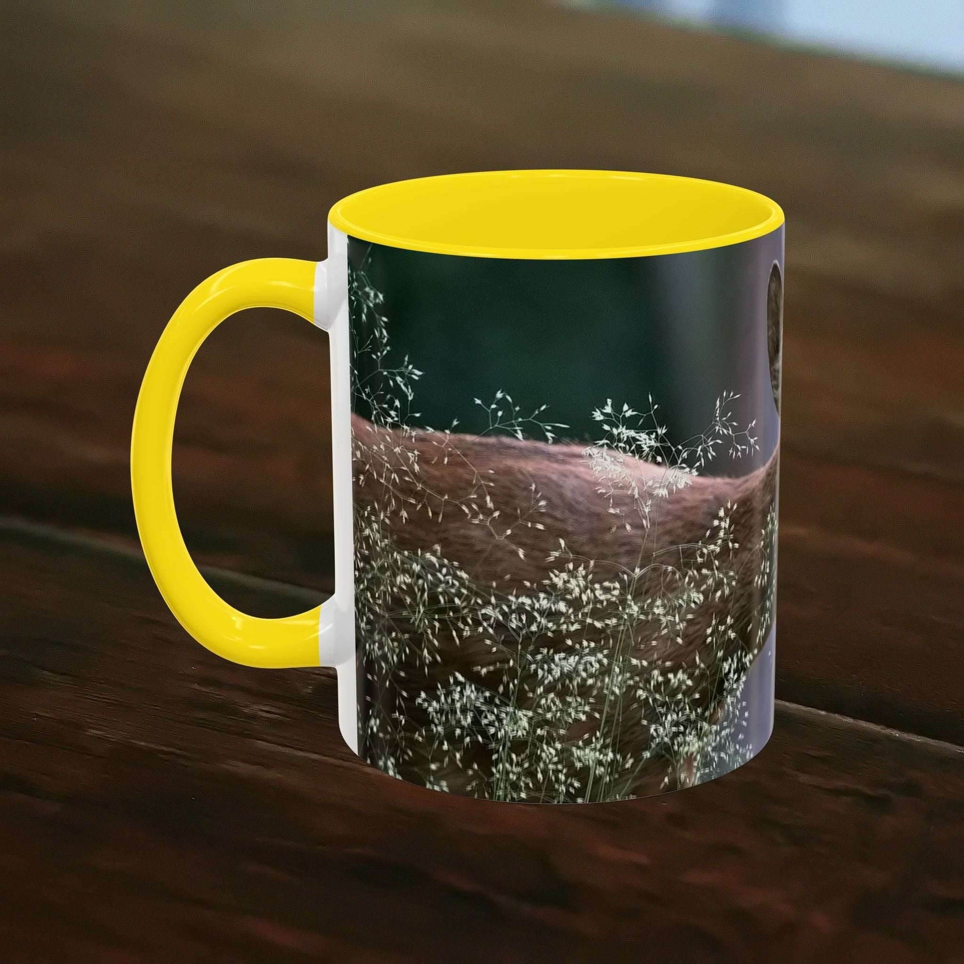 Nature-inspired deer ceramic mug with floral accents, yellow interior, and handle, 11oz.
