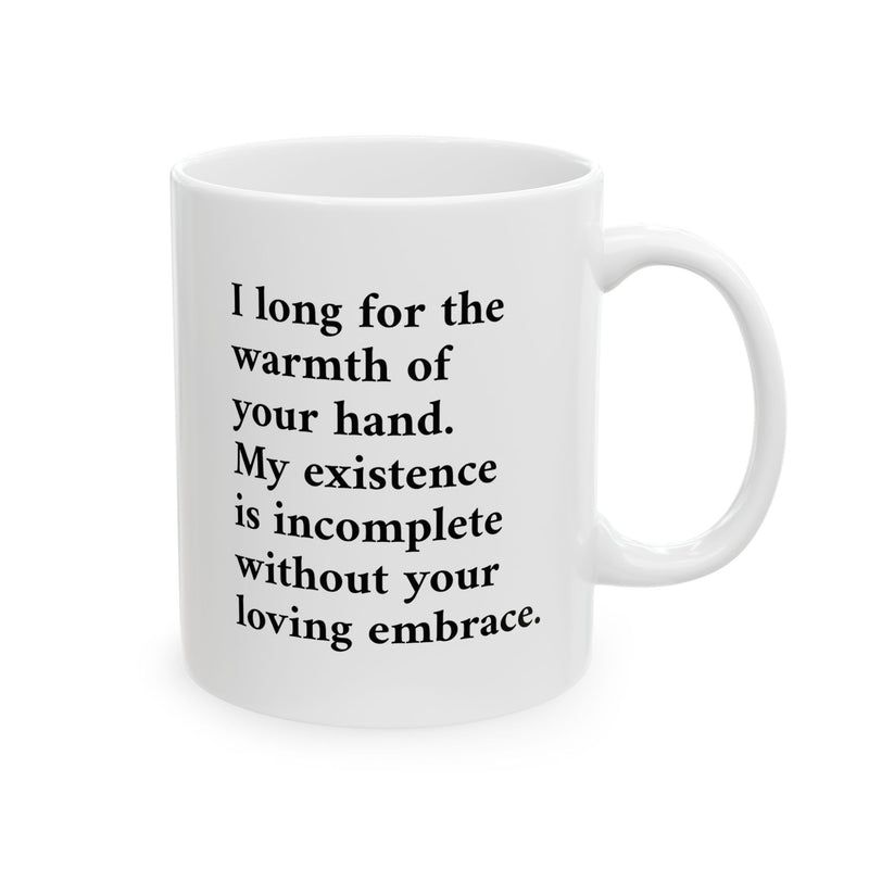 Minimalist 11oz Romantic Poetry Mug — 'I long for the warmth of your hand' Ceramic Coffee Mug standing beside a fresh green plant.