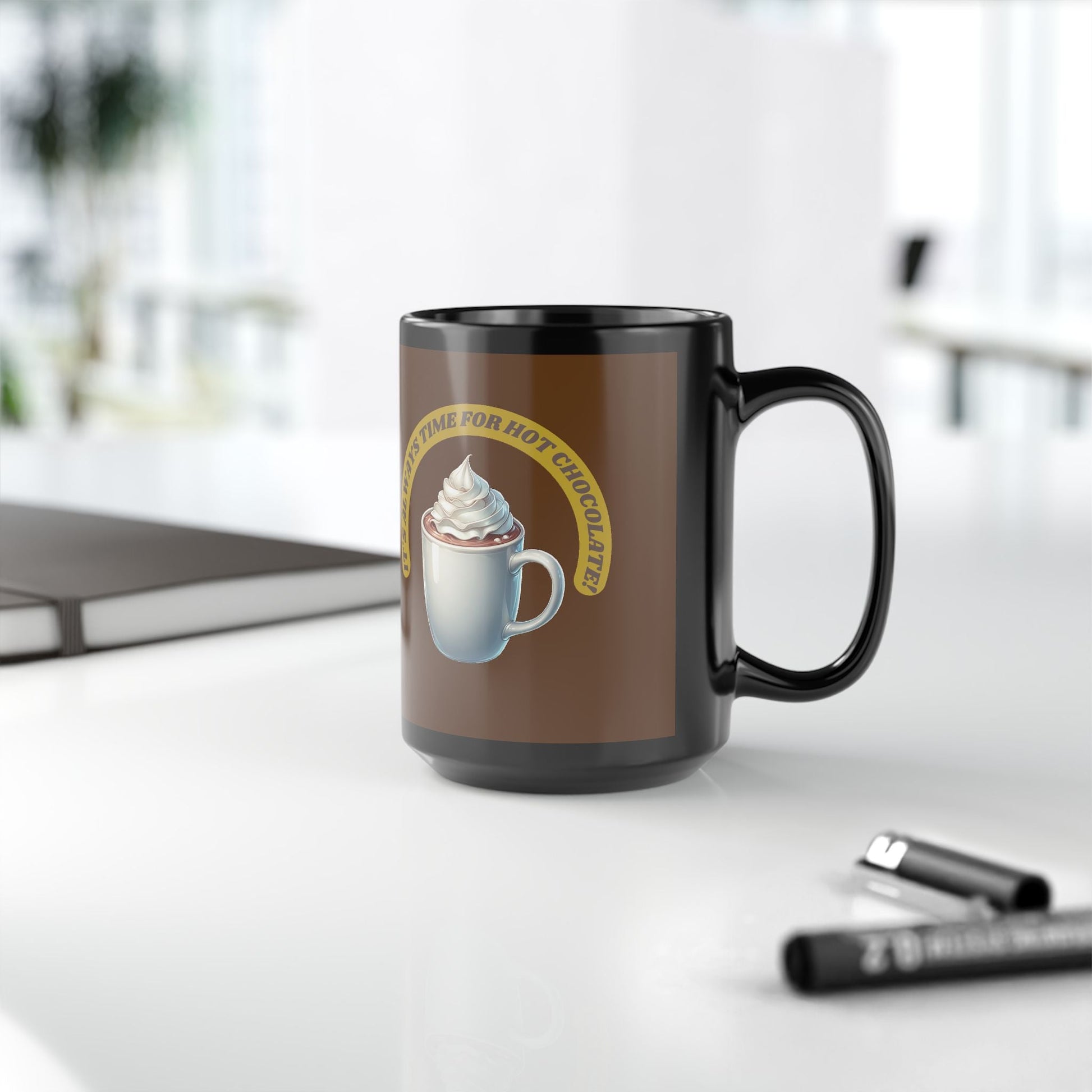 Black ceramic mug with "It's always time for hot chocolate" design, available in 11oz and 15oz sizes.