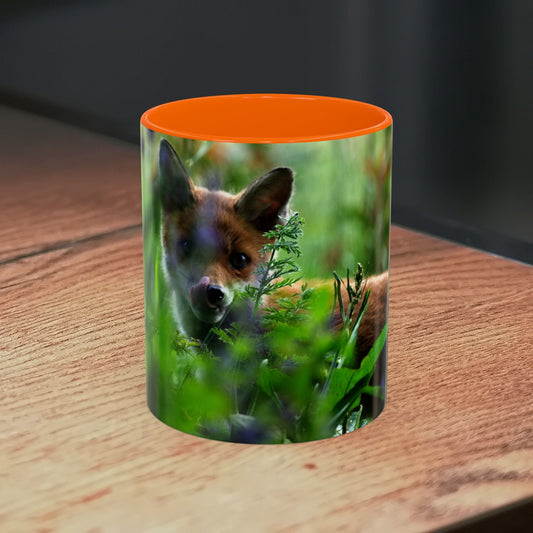 Fox-inspired accent coffee mug with wildlife design on wooden surface.