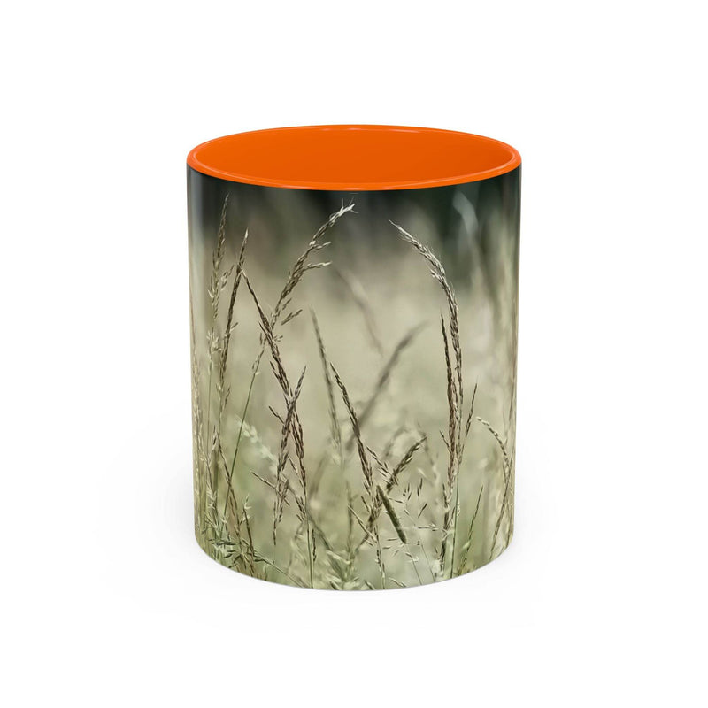 Schöner 325ml Natur-Becher mit blühendem Grasdruck, gestaltet mit einem kräftigen orangen Henkel und oranger Innenseite.