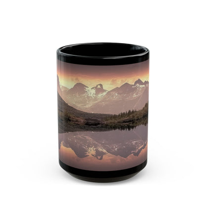 Sturdy 15oz Mountain Reflection Black Mug — Scenic Sunset Lake Coffee Mug next to fresh minimalist home decor items.