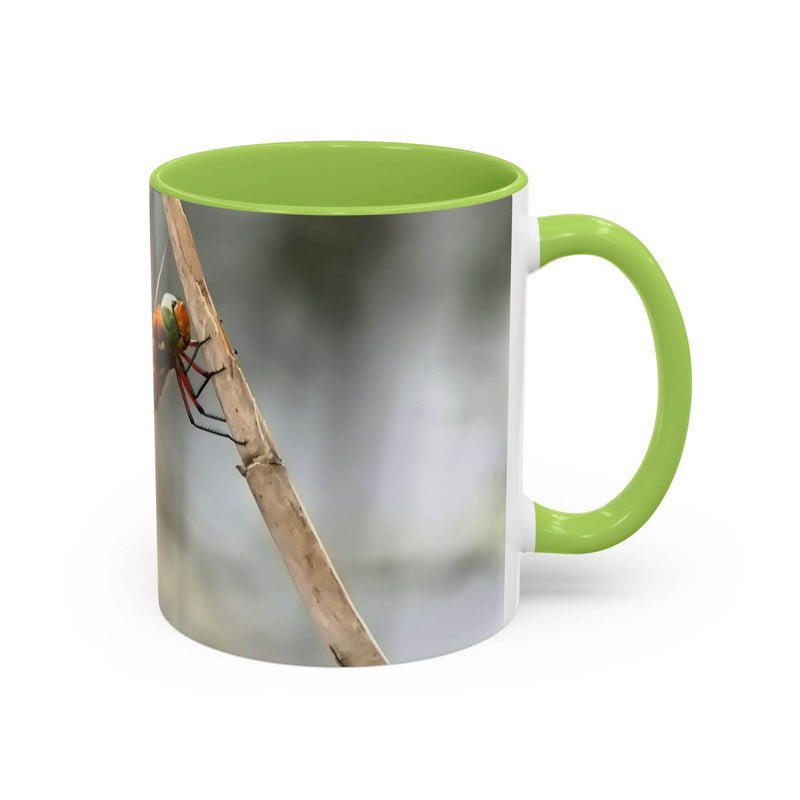 High-quality 325ml ceramic mug featuring a dragonfly illustration with an eye-catching contrast light green handle and interior.