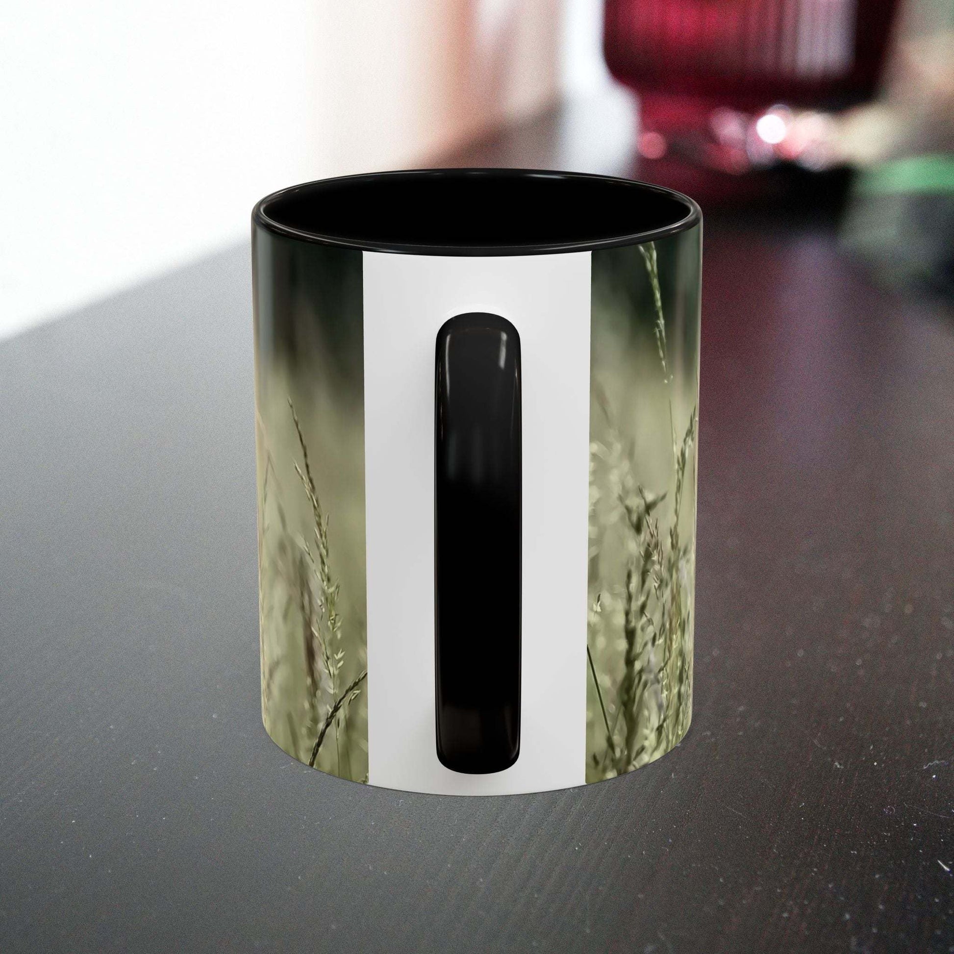 Ceramic mug with flowering grass design, perfect for nature lovers.