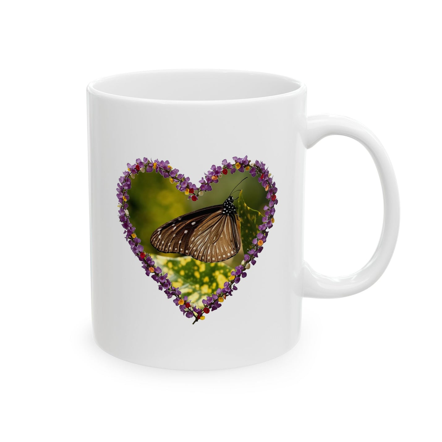 Glossy white 11oz floral heart frame ceramic cup showcasing a vibrant butterfly design for peaceful morning pauses.