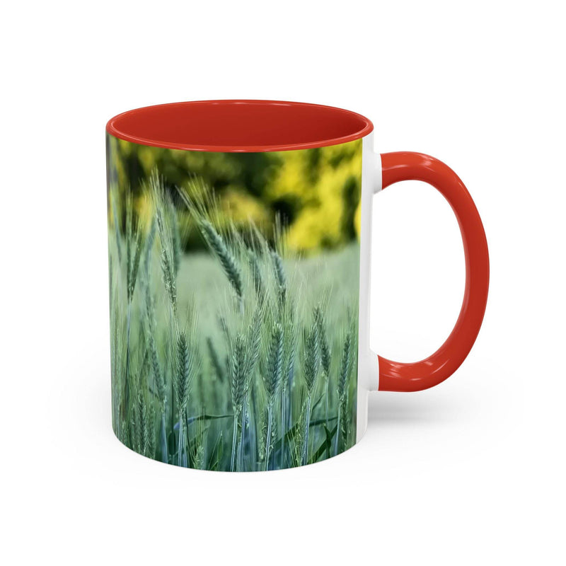 Serene 11oz Mug - Wheat Field Design Coffee Mug showing the red handle and red inside near warm textiles.