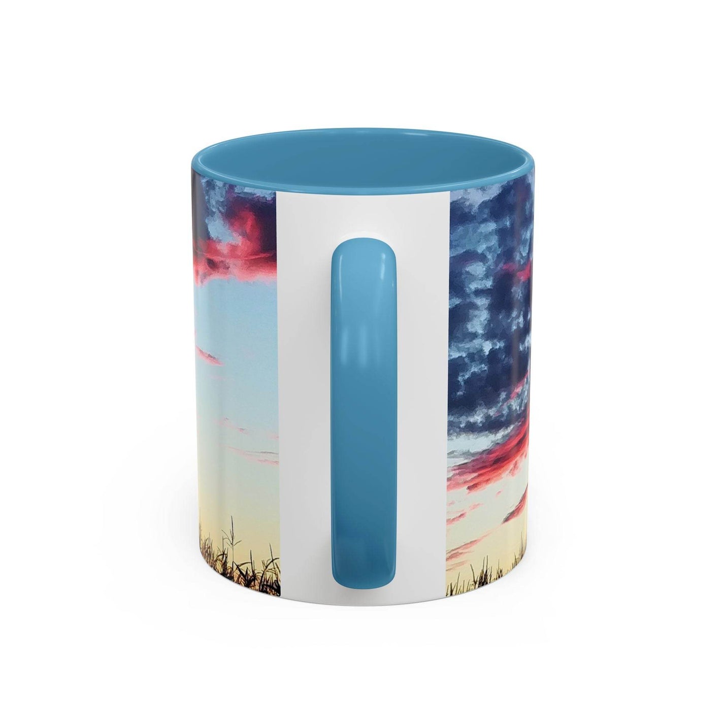 Vibrant 11oz Sunset Accent Coffee Mug for home office decor, featuring a light blue handle and inside on wood.