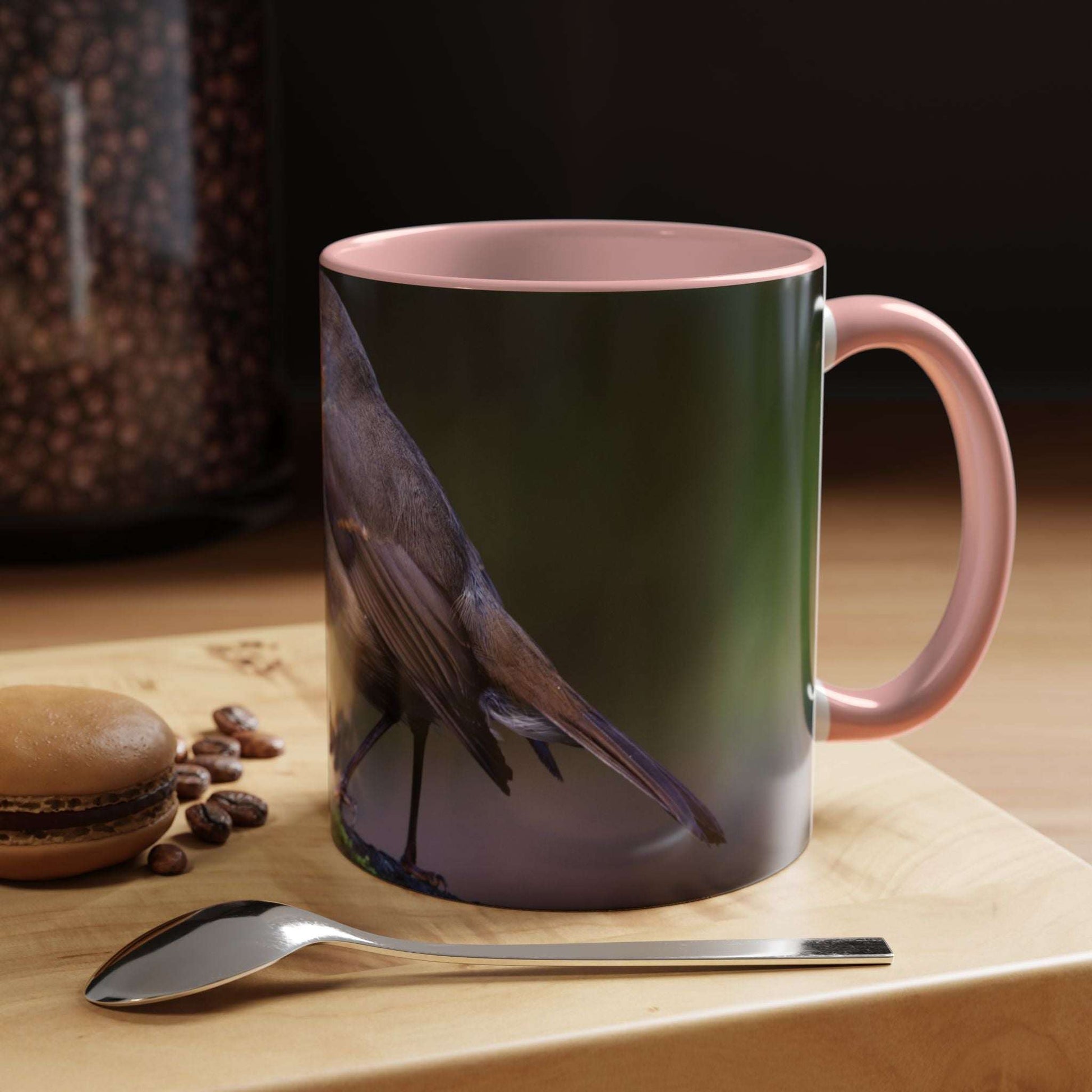White ceramic 11oz Robin Mug with robin illustration and pink interior.
