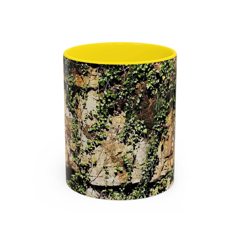 Adventurous 11oz Mug - Overgrown Rocks Adventure Coffee Mug showing the yellow handle and yellow inside next to a bowl.