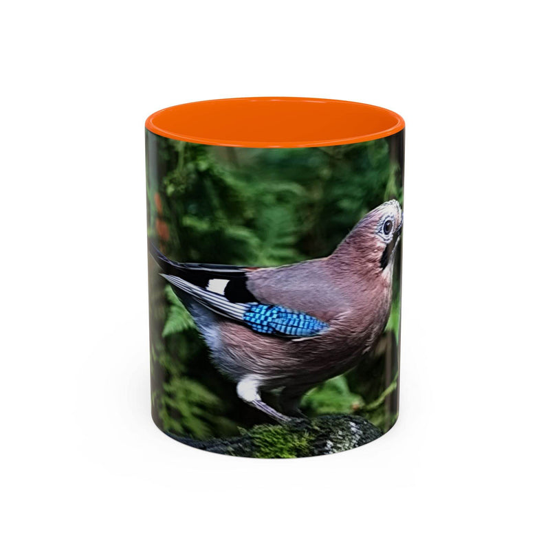 11oz colorful jay coffee mug with an orange handle and orange inside.
