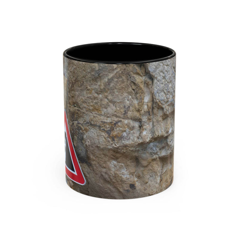 Rugged 11oz Rocky Mug, Mountain Lovers, Danger of Falling Rocks showing the black handle and black inside near stones.