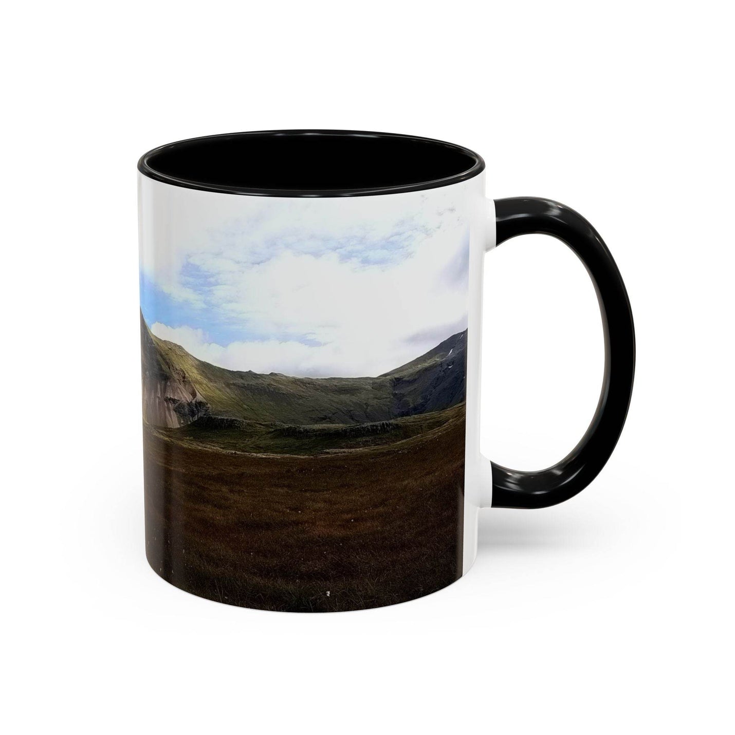 Premium 11oz nature Coffee Mug - Iceland Scenery showing the black handle and black inside near a window.