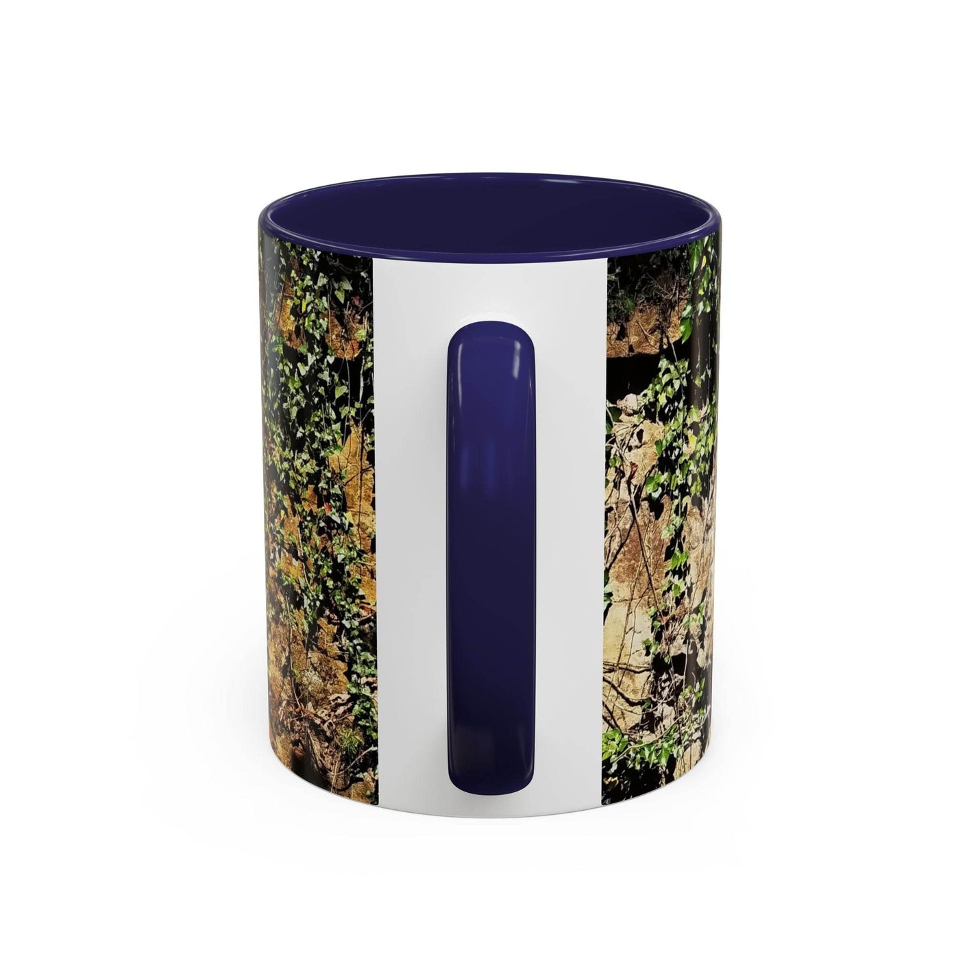 Outdoorsy 11oz Mug - Overgrown Rocks Adventure Coffee Mug by a window, displaying its navy handle and navy inside.