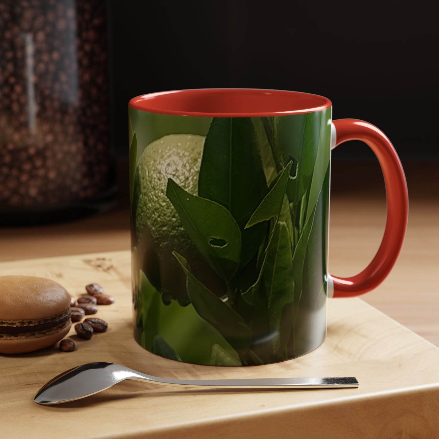 Colorful 11oz Fruit Mug on a shelf, showcasing its bright red handle and red inside design finish.