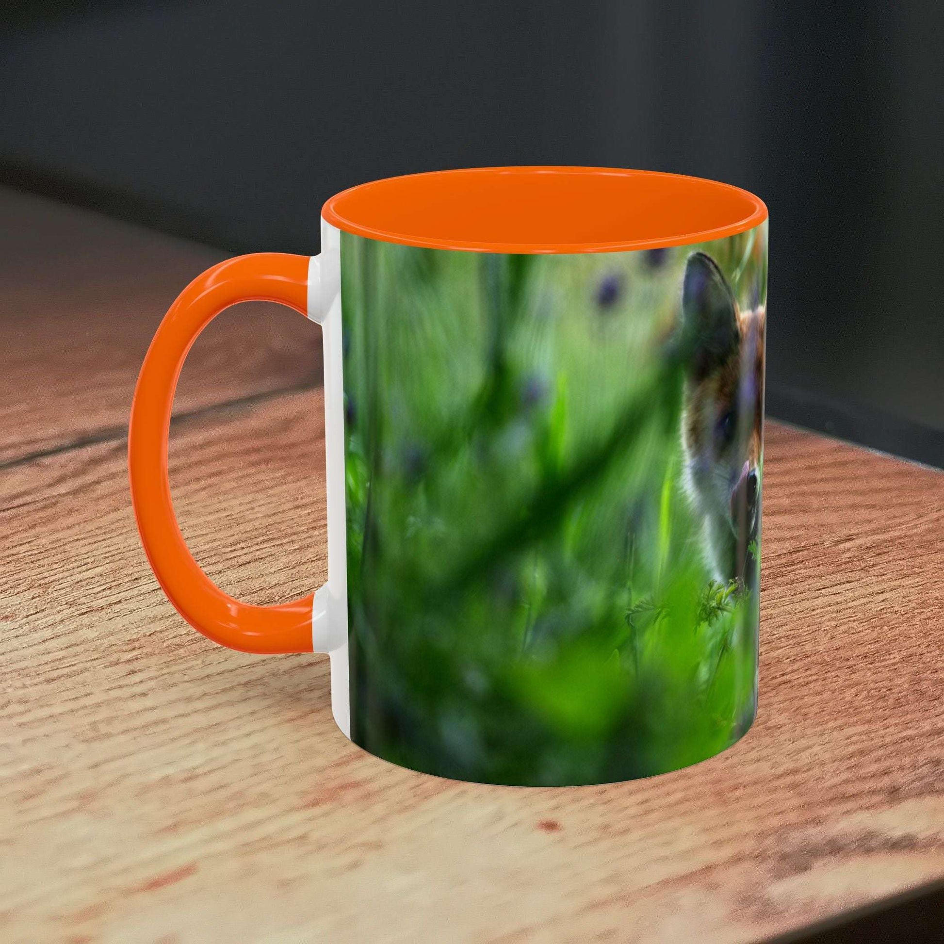 Fox-inspired accent coffee mug with nature design, vibrant orange handle, and high-quality ceramic for wildlife decor.
