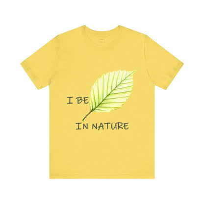 Unisex yellow tee with "I Be-leaf In Nature" leaf motif, eco-friendly fashion.