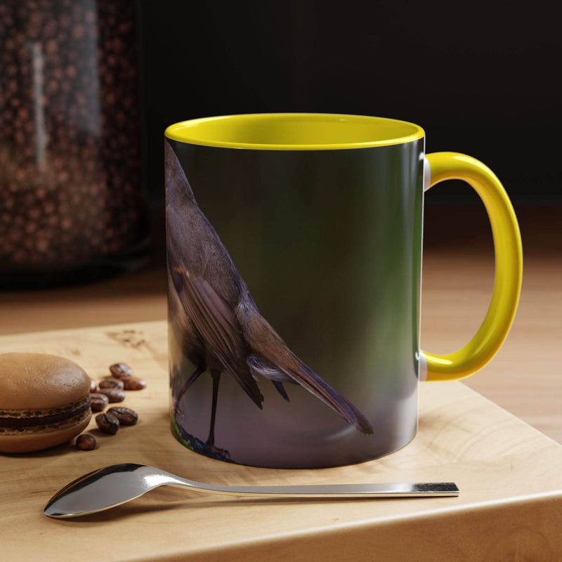 Elegant 11oz ceramic robin mug showcasing a yellow handle and yellow inside, designed for passionate bird lovers.