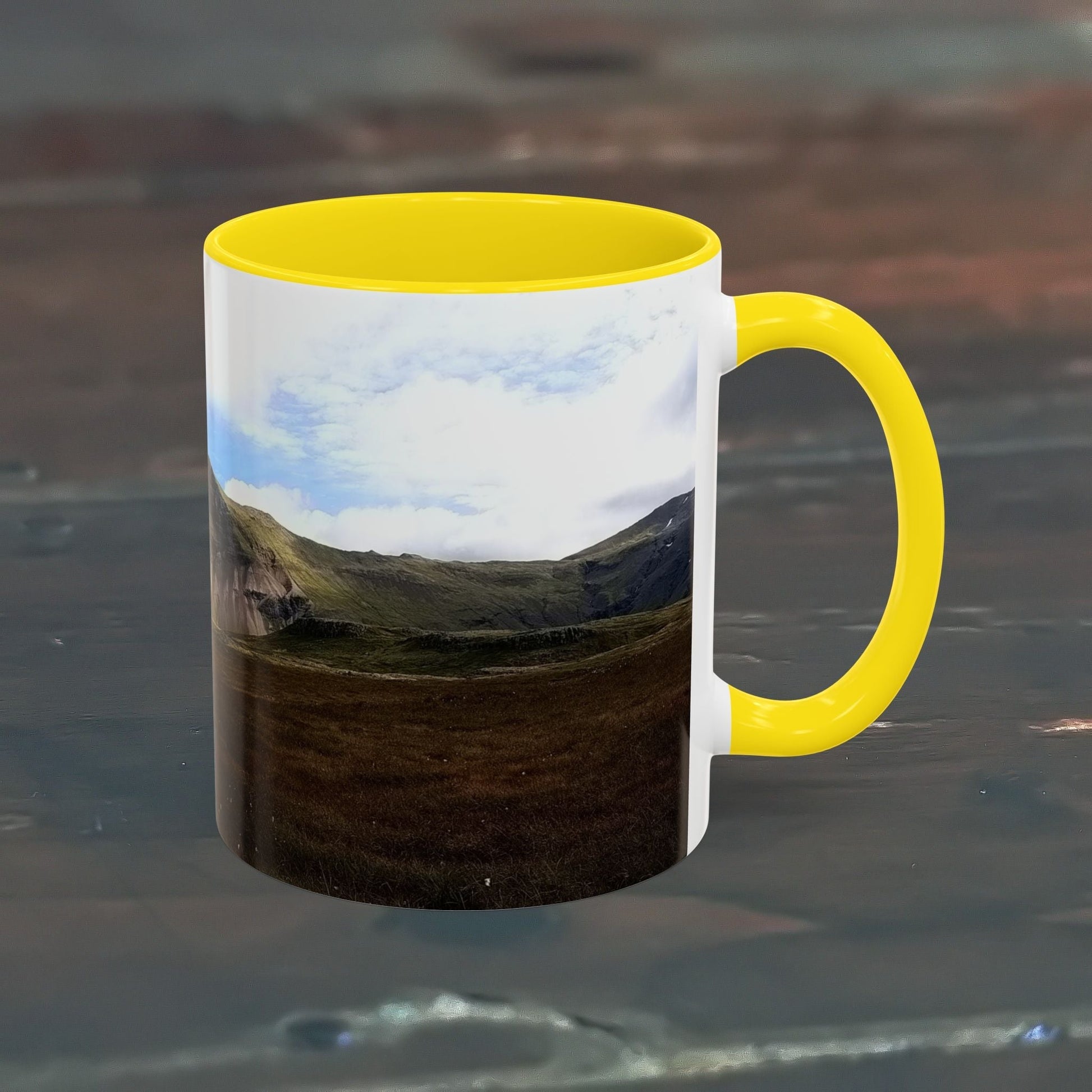 11oz coffee mug with Iceland scenery design and yellow handle.