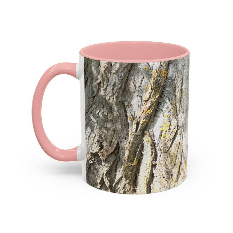 11oz rustic Coffee Mug - Tree Trunk Design with a pink handle and pink inside on a table.