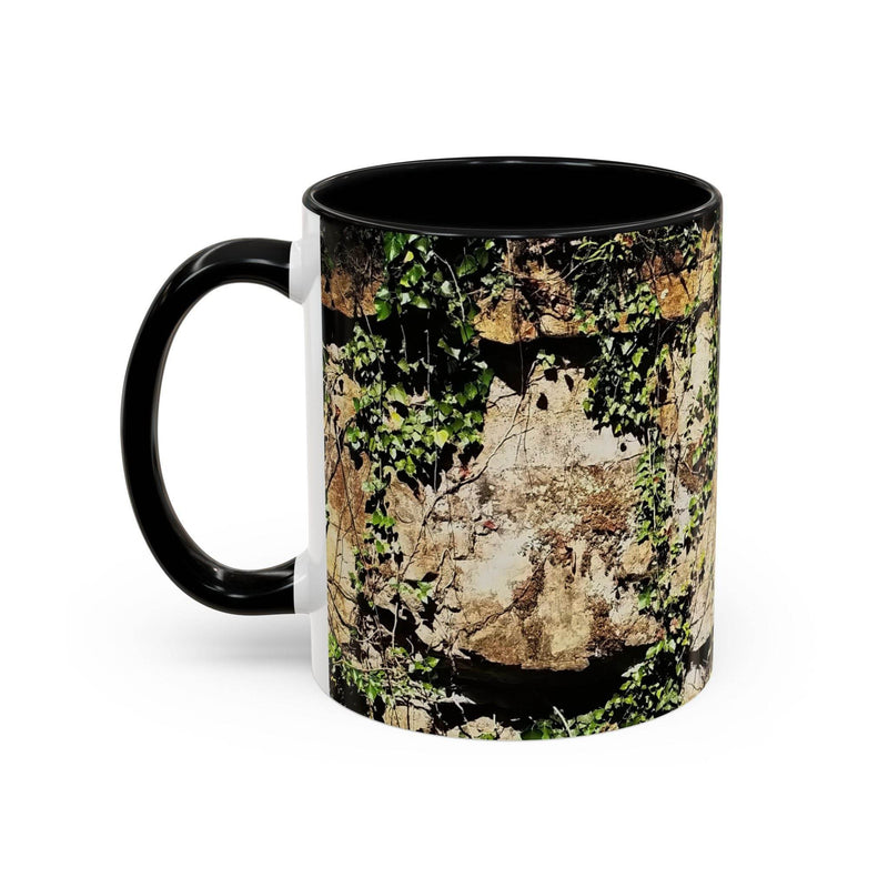 Robust 11oz Mug - Overgrown Rocks Adventure Coffee Mug with a black handle and black inside on a desk.