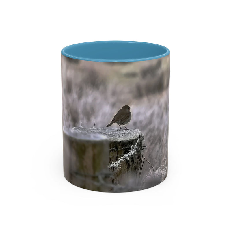 11oz mug featuring a robin nature print with a Light Blue handle and interior.