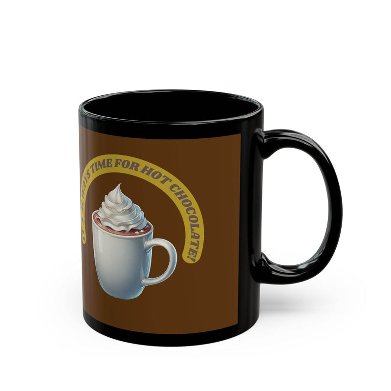 Premium 11oz cozy Mug - It's always time for hot chocolate - Black standing next to fresh green indoor plants.