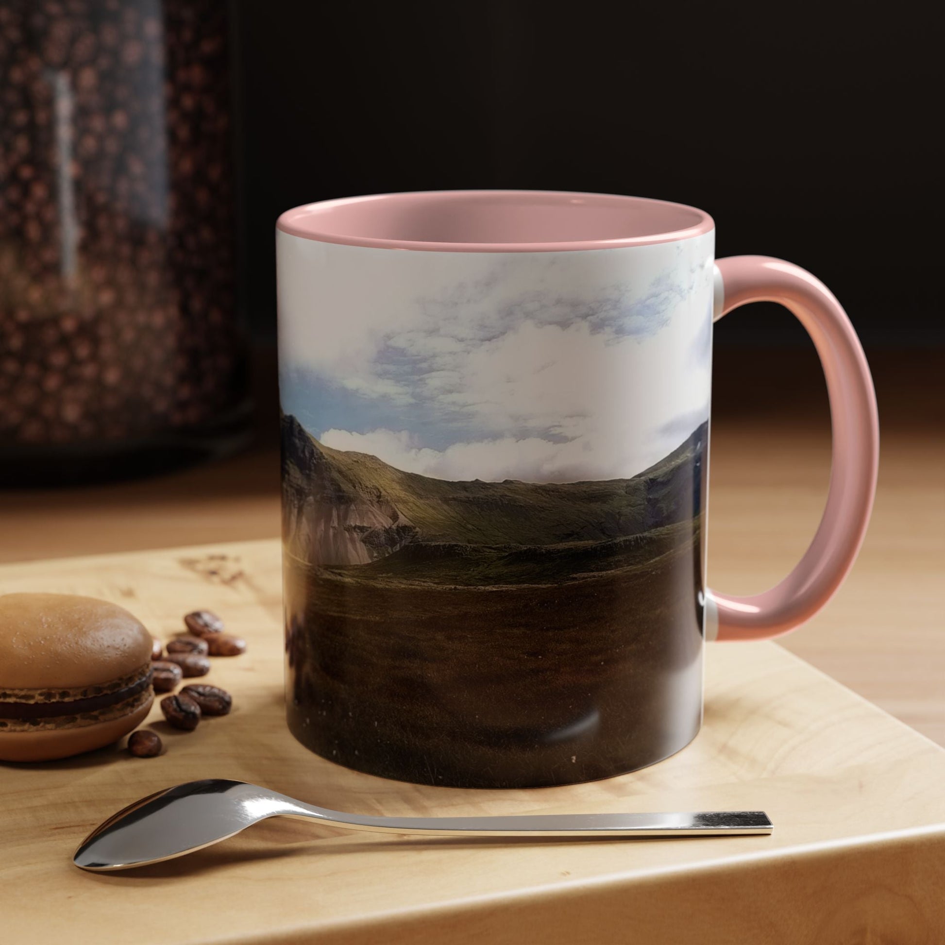 Coffee mug featuring Iceland scenery with pink handle and rim, 11oz capacity.