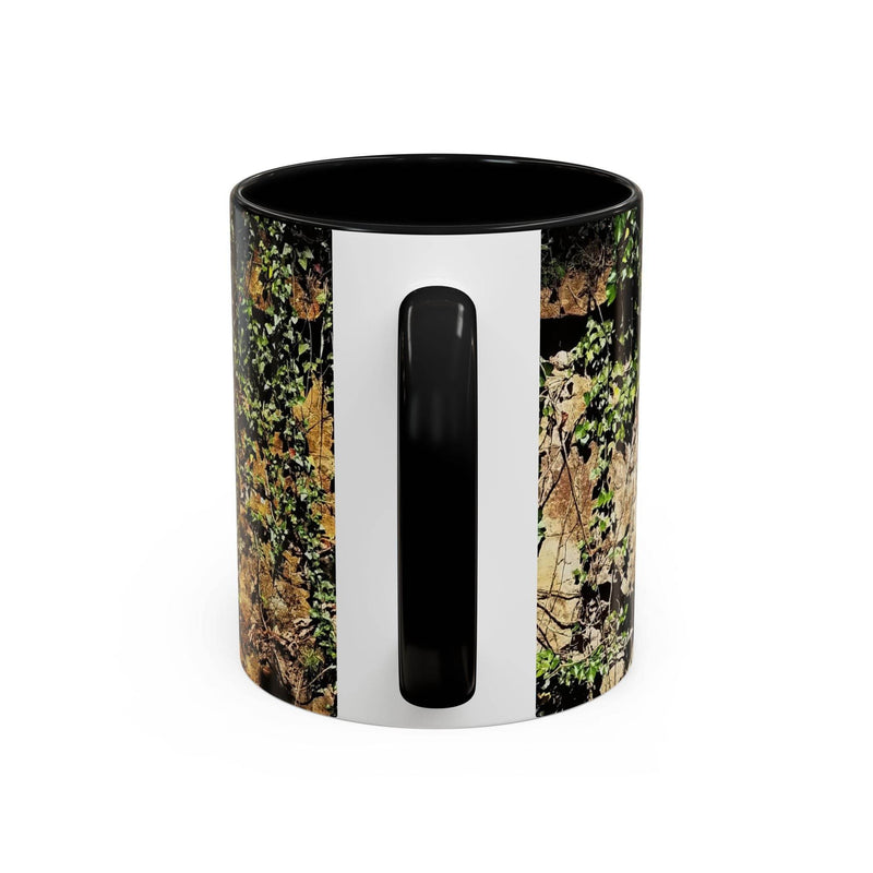 Outdoorsy 11oz Mug - Overgrown Rocks Adventure Coffee Mug held in hands, showcasing its black handle and black inside.